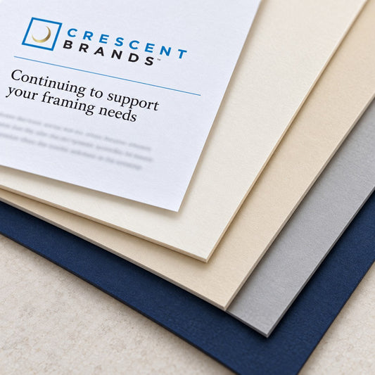 Crescent Brands letterhead resting on layered matboard sheets: Continuing to support your framing needs.